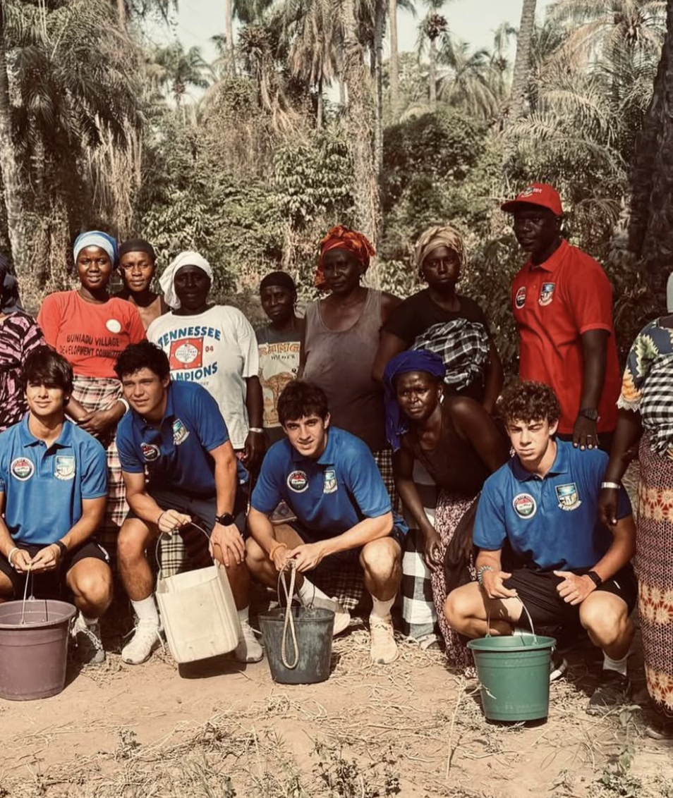 Community members at the old well