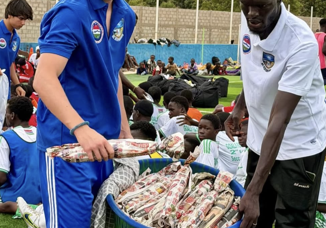 Distributing snacks to campers