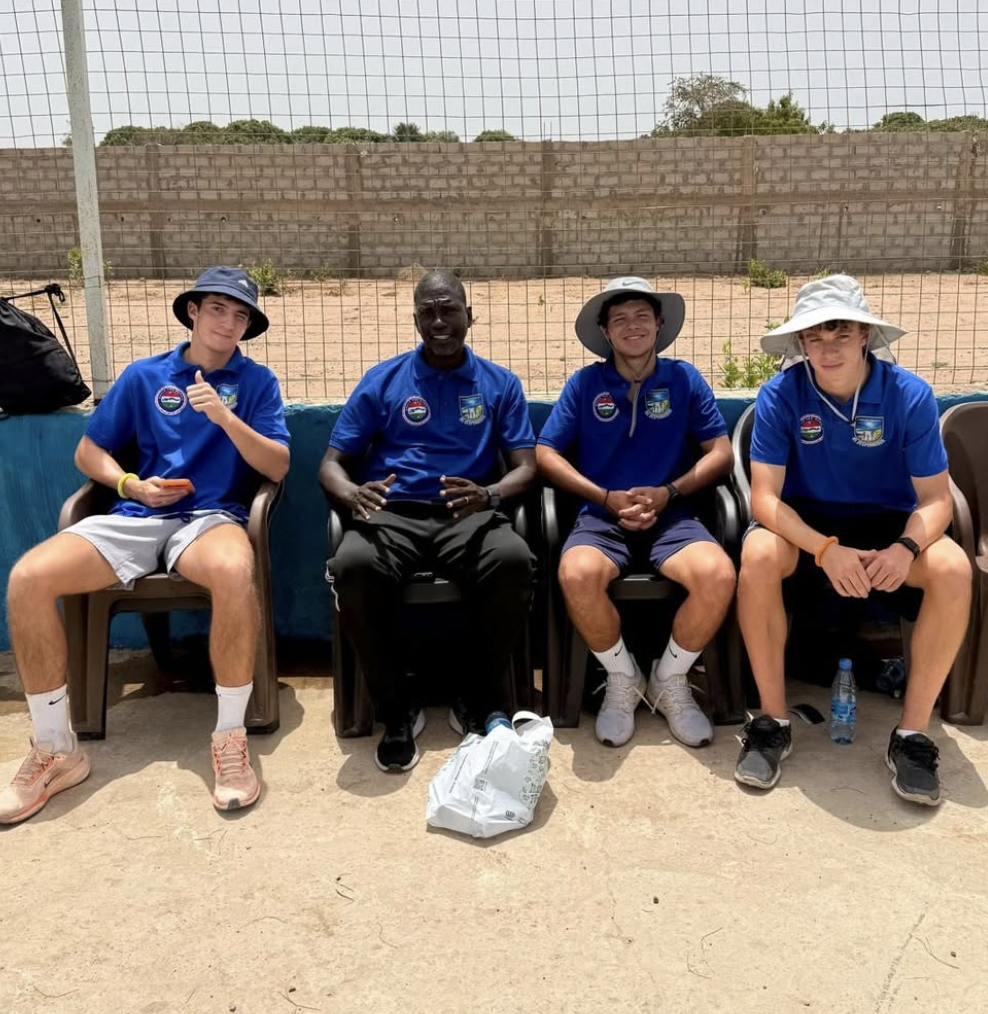 Founders sitting with coaching staff