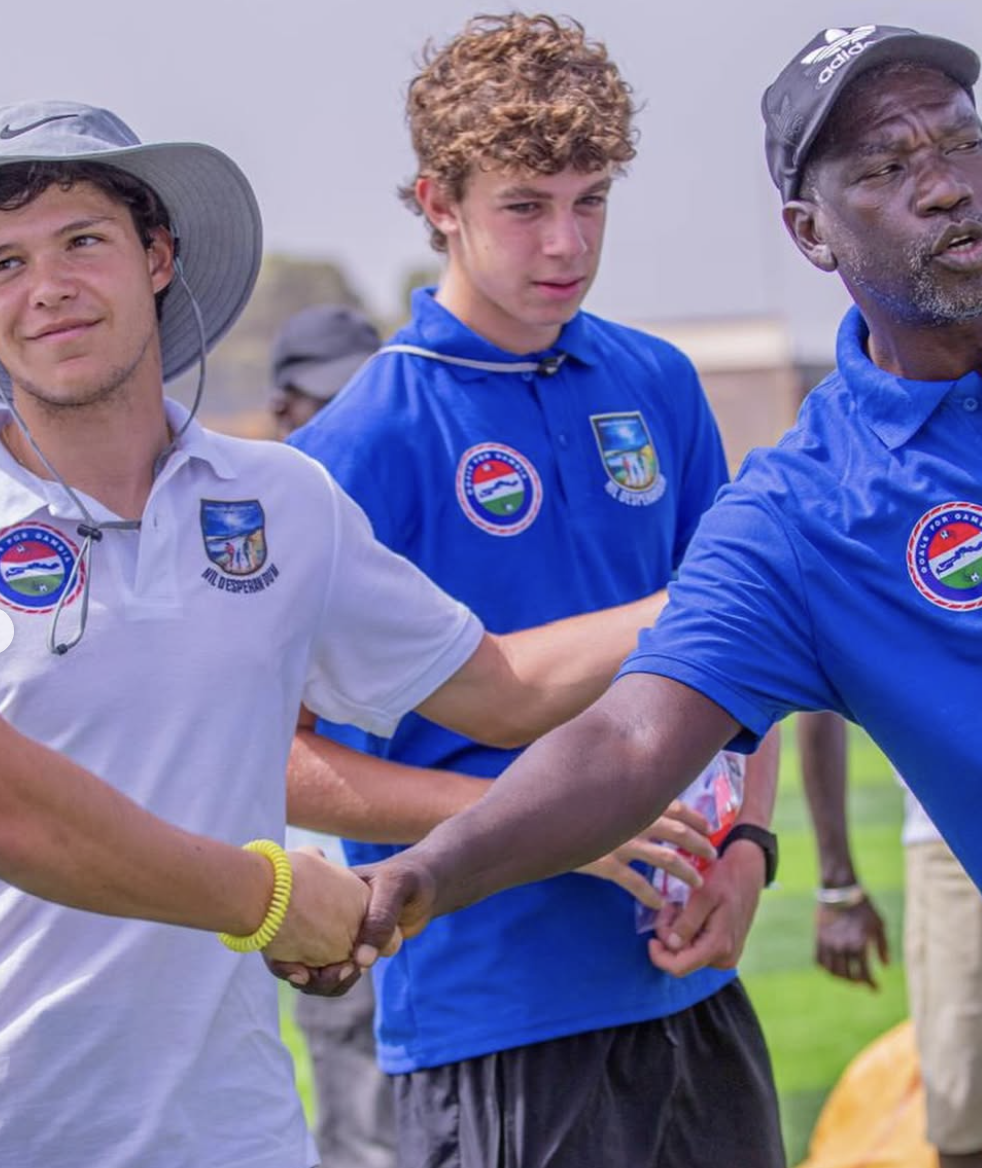 Handshake with coaching staff