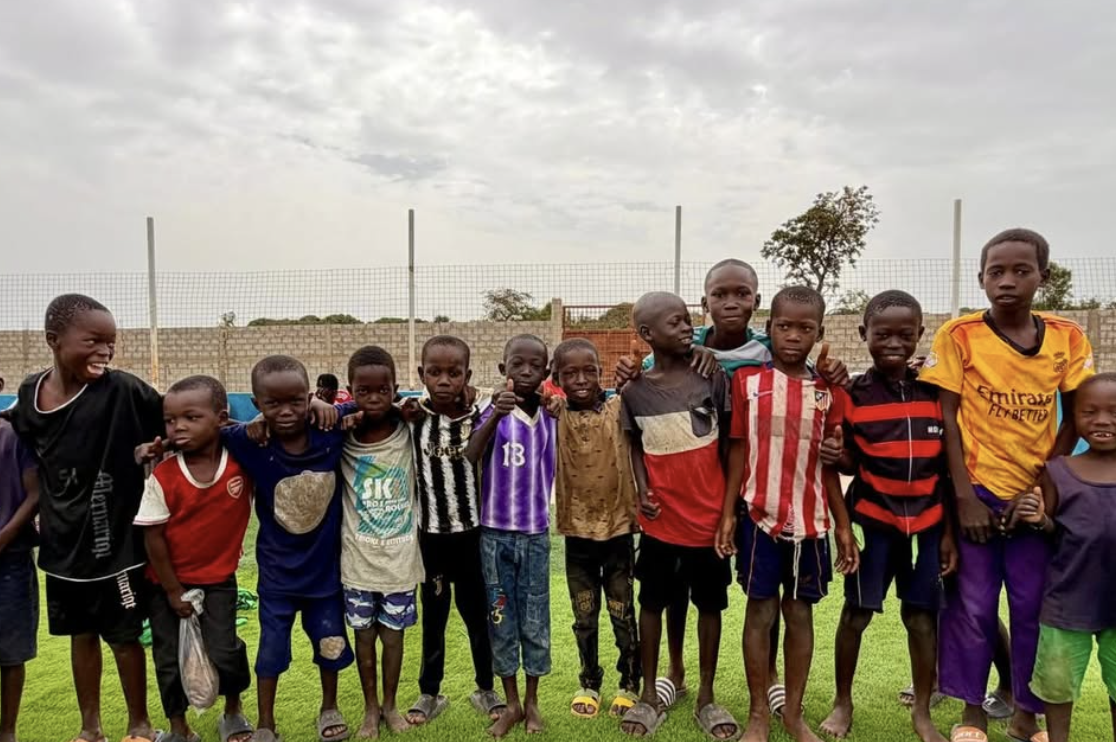 Young kids smiling for the camera