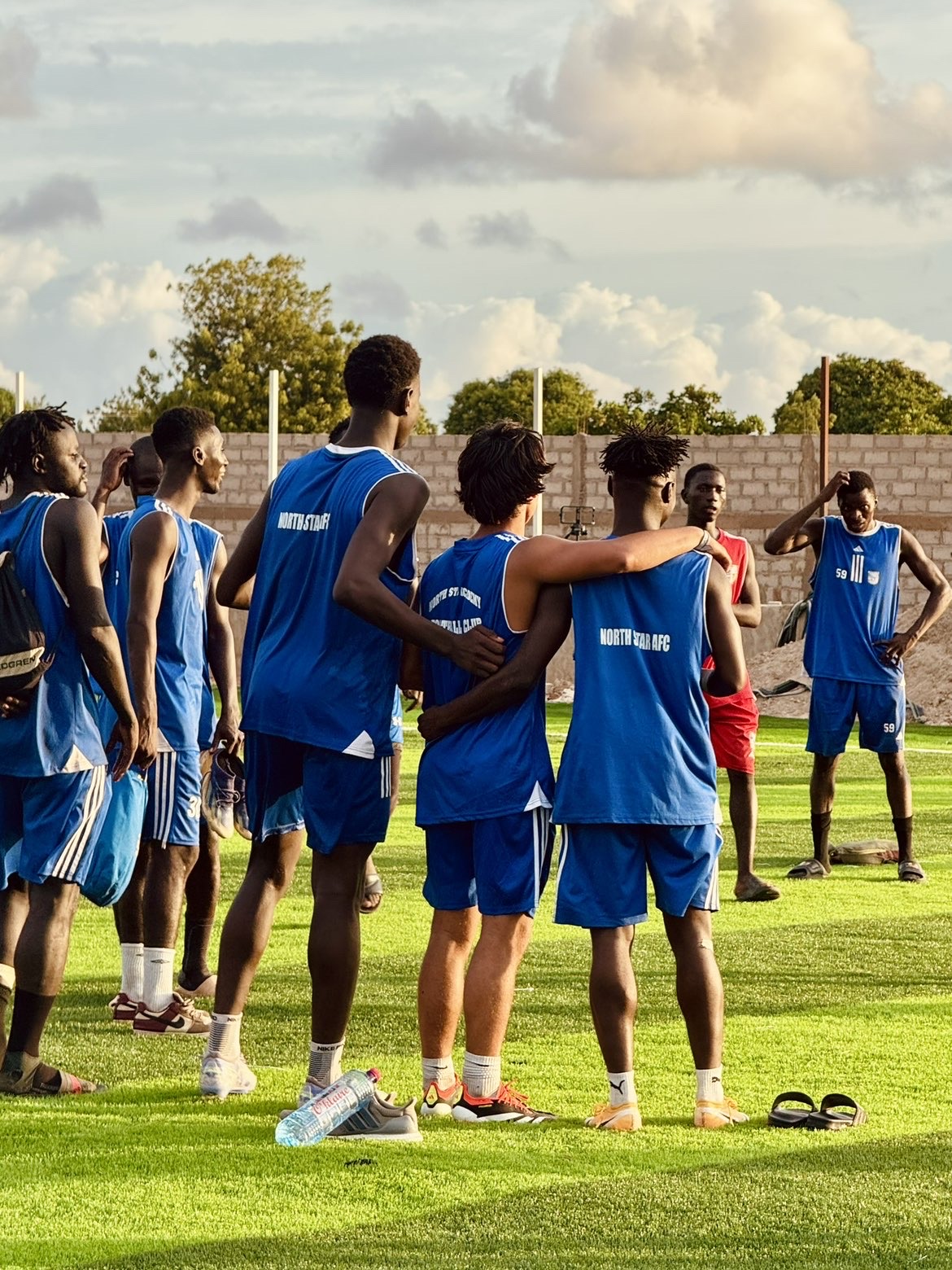 North Star AFC players gathered together on the field